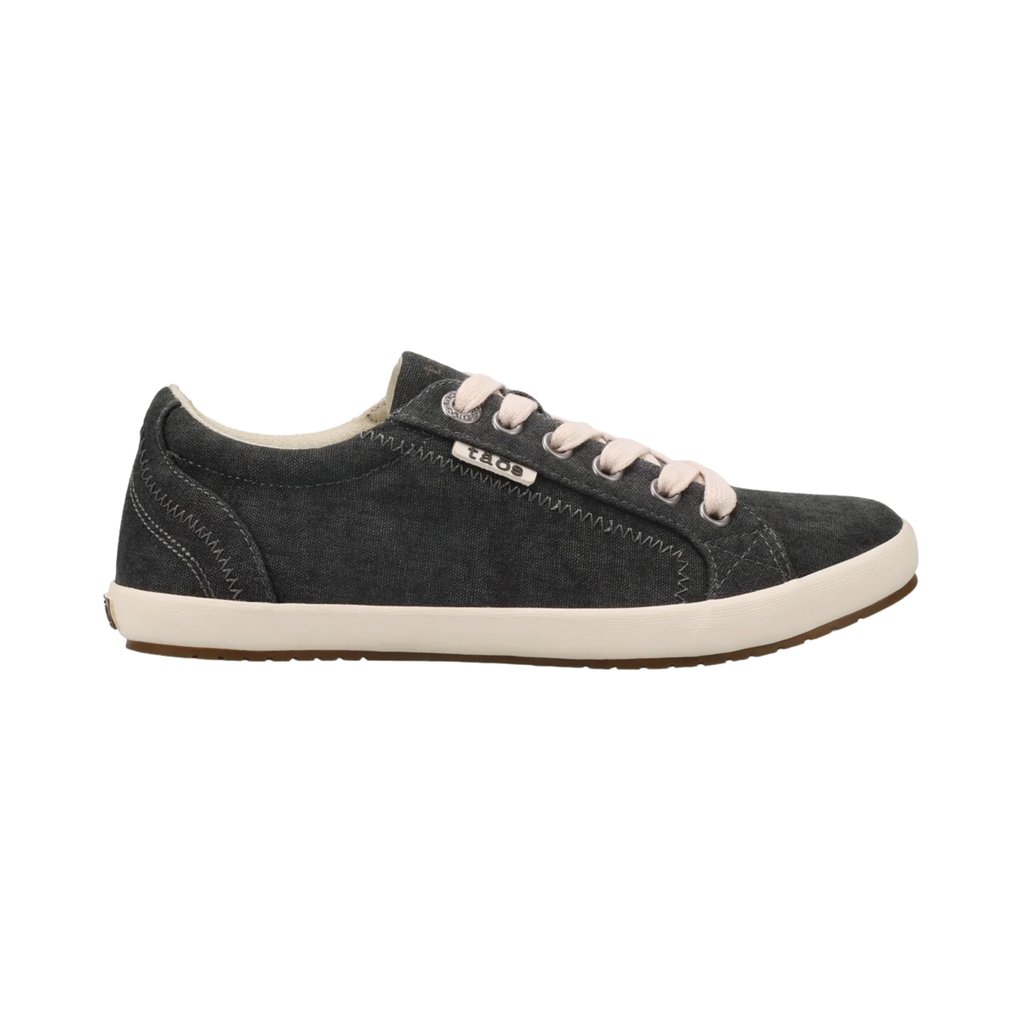 Side view of the Women’s Taos Star in Charcoal Washed Canvas, showcasing the vintage-inspired washed canvas upper, lace-up design, and Curves & Pods® removable footbed for arch and metatarsal support.