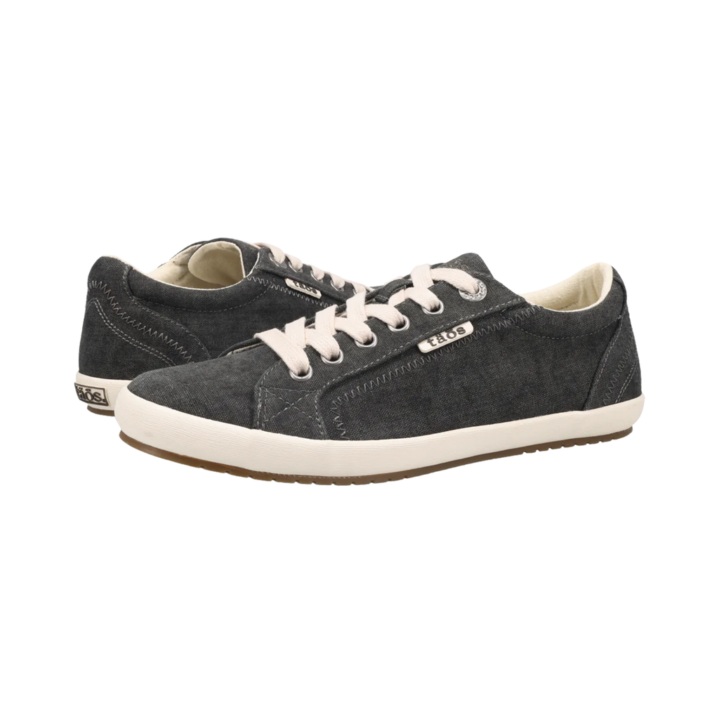 Side view of the Women’s Taos Star in Charcoal Washed Canvas, showcasing the vintage-inspired washed canvas upper, lace-up design, and Curves & Pods® removable footbed for arch and metatarsal support.